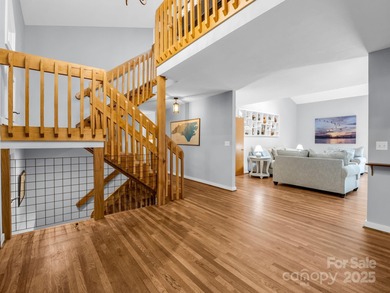 Beautiful resort home on 2.4 private wooded acres within minutes on Rumbling Bald Resort on Lake Lure in North Carolina - for sale on GolfHomes.com, golf home, golf lot