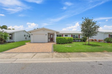 Welcome to your new home where comfort meets style in every on Mainlands Golf Club in Florida - for sale on GolfHomes.com, golf home, golf lot