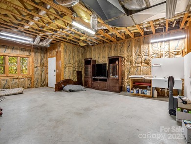 Beautiful resort home on 2.4 private wooded acres within minutes on Rumbling Bald Resort on Lake Lure in North Carolina - for sale on GolfHomes.com, golf home, golf lot