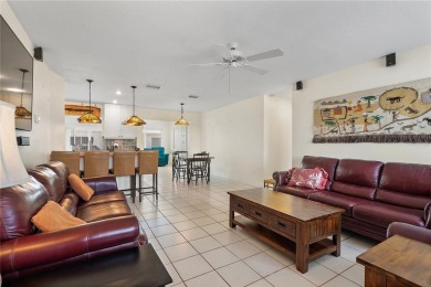 Welcome to your new home where comfort meets style in every on Mainlands Golf Club in Florida - for sale on GolfHomes.com, golf home, golf lot