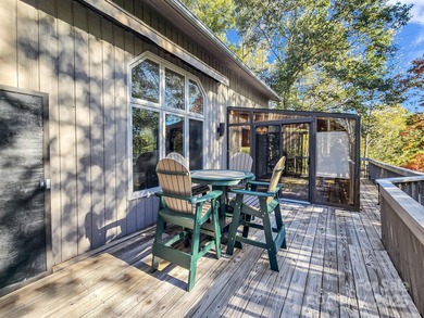 Beautiful resort home on 2.4 private wooded acres within minutes on Rumbling Bald Resort on Lake Lure in North Carolina - for sale on GolfHomes.com, golf home, golf lot