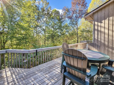 Beautiful resort home on 2.4 private wooded acres within minutes on Rumbling Bald Resort on Lake Lure in North Carolina - for sale on GolfHomes.com, golf home, golf lot