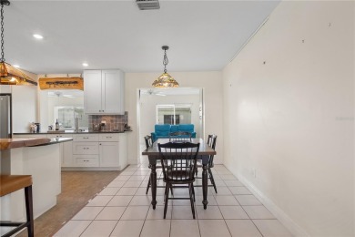 Welcome to your new home where comfort meets style in every on Mainlands Golf Club in Florida - for sale on GolfHomes.com, golf home, golf lot