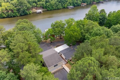 Walk easily down to the waterfront! Lakefront property in on Tanglewood Shores Golf Club in Virginia - for sale on GolfHomes.com, golf home, golf lot