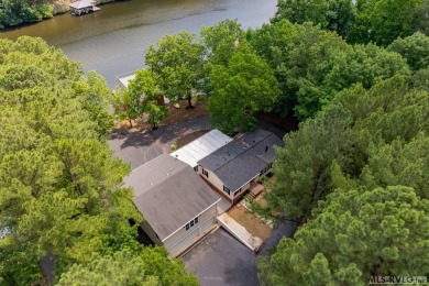 Walk easily down to the waterfront! Lakefront property in on Tanglewood Shores Golf Club in Virginia - for sale on GolfHomes.com, golf home, golf lot