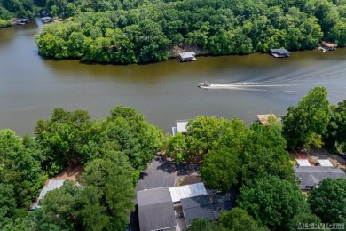 Walk easily down to the waterfront! Lakefront property in on Tanglewood Shores Golf Club in Virginia - for sale on GolfHomes.com, golf home, golf lot