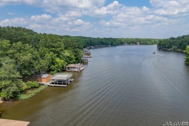 Walk easily down to the waterfront! Lakefront property in on Tanglewood Shores Golf Club in Virginia - for sale on GolfHomes.com, golf home, golf lot