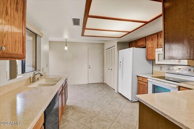 Discover this immaculate townhouse in the desirable active adult on Westbrook Village Golf Club in Arizona - for sale on GolfHomes.com, golf home, golf lot