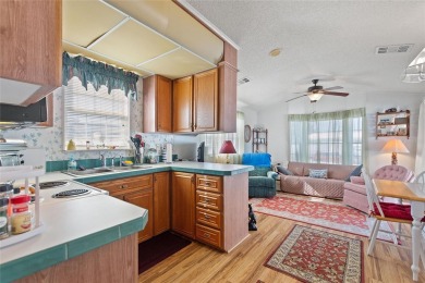 This charming 1 bedroom, 1 bath home offers a delightful blend on Southern Dunes Golf and Country Club in Florida - for sale on GolfHomes.com, golf home, golf lot