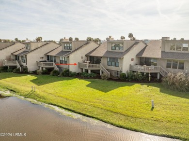 Discover the perfect coastal retreat at 123 Ocean Point Drive on Ocean Point Golf Links in South Carolina - for sale on GolfHomes.com, golf home, golf lot