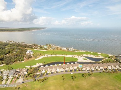 Discover the perfect coastal retreat at 123 Ocean Point Drive on Ocean Point Golf Links in South Carolina - for sale on GolfHomes.com, golf home, golf lot