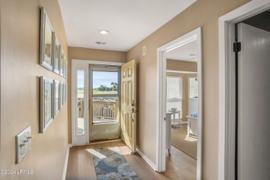 Discover the perfect coastal retreat at 123 Ocean Point Drive on Ocean Point Golf Links in South Carolina - for sale on GolfHomes.com, golf home, golf lot