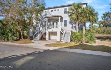 Enjoy coastal living with this charming 4-bedroom, 3-bathroom on Ocean Creek Golf Course in South Carolina - for sale on GolfHomes.com, golf home, golf lot