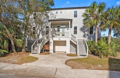 Enjoy coastal living with this charming 4-bedroom, 3-bathroom on Ocean Creek Golf Course in South Carolina - for sale on GolfHomes.com, golf home, golf lot