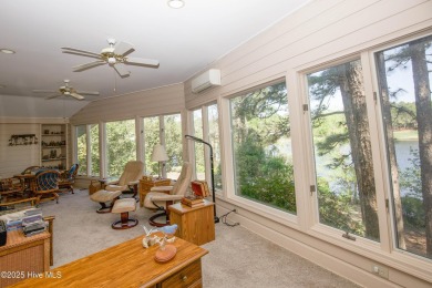 Beautiful and spacious home right on the water and with a great on Seven Lakes Country Club in North Carolina - for sale on GolfHomes.com, golf home, golf lot