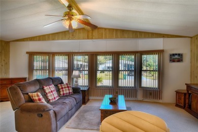 This home sits on a corner lot near our 18-hole golf course. It on Barefoot Bay Golf Course in Florida - for sale on GolfHomes.com, golf home, golf lot