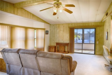 This home sits on a corner lot near our 18-hole golf course. It on Barefoot Bay Golf Course in Florida - for sale on GolfHomes.com, golf home, golf lot