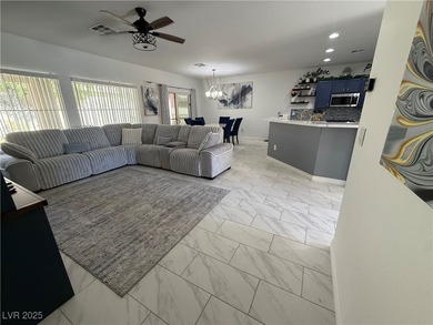 Enjoy your morning coffee from this beautiful courtyard on the on Aliante Golf Club in Nevada - for sale on GolfHomes.com, golf home, golf lot