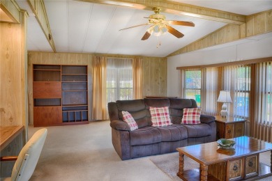 This home sits on a corner lot near our 18-hole golf course. It on Barefoot Bay Golf Course in Florida - for sale on GolfHomes.com, golf home, golf lot