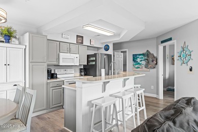 PRIME LOCATION! This 1st Floor End Unit is a true showstopper on Brunswick Plantation and Golf Resorts in North Carolina - for sale on GolfHomes.com, golf home, golf lot