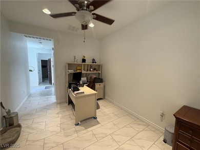 Enjoy your morning coffee from this beautiful courtyard on the on Aliante Golf Club in Nevada - for sale on GolfHomes.com, golf home, golf lot