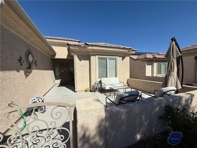 Enjoy your morning coffee from this beautiful courtyard on the on Aliante Golf Club in Nevada - for sale on GolfHomes.com, golf home, golf lot