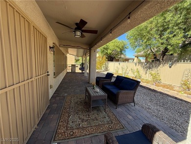 Enjoy your morning coffee from this beautiful courtyard on the on Aliante Golf Club in Nevada - for sale on GolfHomes.com, golf home, golf lot