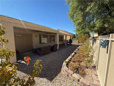 Enjoy your morning coffee from this beautiful courtyard on the on Aliante Golf Club in Nevada - for sale on GolfHomes.com, golf home, golf lot