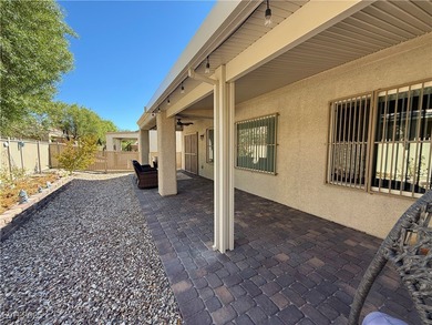 Enjoy your morning coffee from this beautiful courtyard on the on Aliante Golf Club in Nevada - for sale on GolfHomes.com, golf home, golf lot