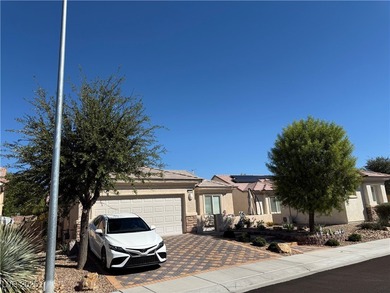 Enjoy your morning coffee from this beautiful courtyard on the on Aliante Golf Club in Nevada - for sale on GolfHomes.com, golf home, golf lot