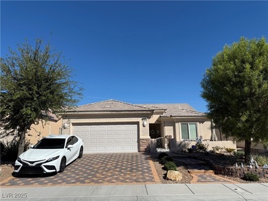 Enjoy your morning coffee from this beautiful courtyard on the on Aliante Golf Club in Nevada - for sale on GolfHomes.com, golf home, golf lot