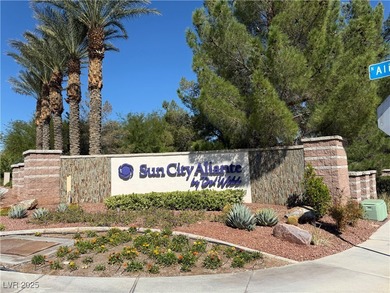 Enjoy your morning coffee from this beautiful courtyard on the on Aliante Golf Club in Nevada - for sale on GolfHomes.com, golf home, golf lot
