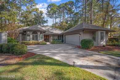 Discover serene golf course living with this beautifully on Oyster Reef Golf Course in South Carolina - for sale on GolfHomes.com, golf home, golf lot