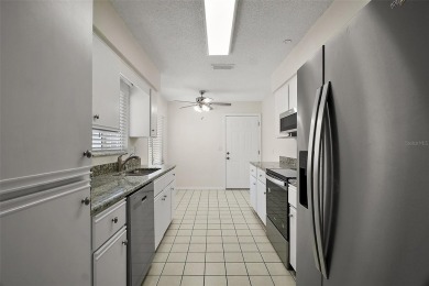 Location, Location!! This home is located directly across the on The Links of Spruce Creek in Florida - for sale on GolfHomes.com, golf home, golf lot