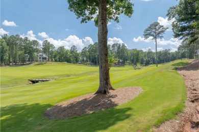 Build your dream home on this exceptional .75-acre homesite on Reynolds Lake Oconee - The Oconee in Georgia - for sale on GolfHomes.com, golf home, golf lot