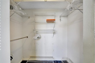 2 BR/2BA second floor residence in a well maintained 55+ on  in Florida - for sale on GolfHomes.com, golf home, golf lot