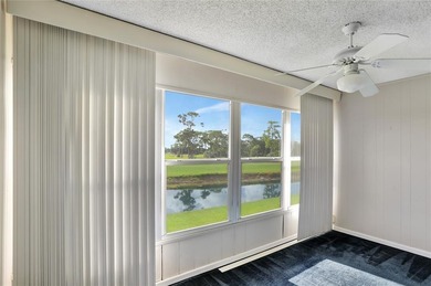 2 BR/2BA second floor residence in a well maintained 55+ on  in Florida - for sale on GolfHomes.com, golf home, golf lot