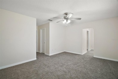 Location, Location!! This home is located directly across the on The Links of Spruce Creek in Florida - for sale on GolfHomes.com, golf home, golf lot