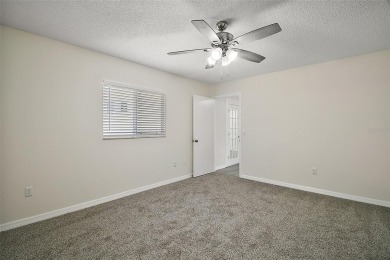Location, Location!! This home is located directly across the on The Links of Spruce Creek in Florida - for sale on GolfHomes.com, golf home, golf lot