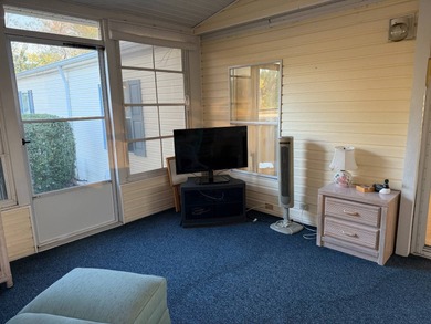 Priced to sell at $34,900, monthly lot rent is $1248 on Pine Lakes Country Club in Florida - for sale on GolfHomes.com, golf home, golf lot