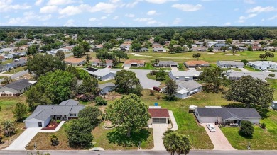 Location, Location!! This home is located directly across the on The Links of Spruce Creek in Florida - for sale on GolfHomes.com, golf home, golf lot