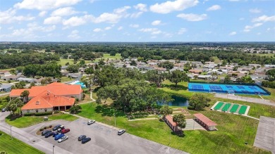 Location, Location!! This home is located directly across the on The Links of Spruce Creek in Florida - for sale on GolfHomes.com, golf home, golf lot