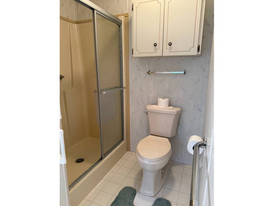 Priced to sell at $34,900, monthly lot rent is $1248 on Pine Lakes Country Club in Florida - for sale on GolfHomes.com, golf home, golf lot