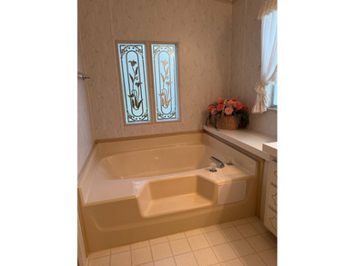 Priced to sell at $34,900, monthly lot rent is $1248 on Pine Lakes Country Club in Florida - for sale on GolfHomes.com, golf home, golf lot