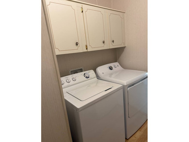 Priced to sell at $34,900, monthly lot rent is $1248 on Pine Lakes Country Club in Florida - for sale on GolfHomes.com, golf home, golf lot