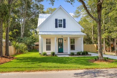 Welcome to 1110 Robinson St, a stunning home nestled in the on Gulf Hills Golf Club in Mississippi - for sale on GolfHomes.com, golf home, golf lot