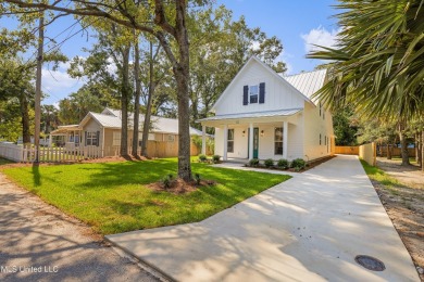 Welcome to 1110 Robinson St, a stunning home nestled in the on Gulf Hills Golf Club in Mississippi - for sale on GolfHomes.com, golf home, golf lot