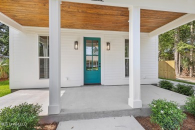 Welcome to 1110 Robinson St, a stunning home nestled in the on Gulf Hills Golf Club in Mississippi - for sale on GolfHomes.com, golf home, golf lot