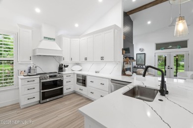 Fully RENOVATED 3-bed, 2.5-bath END-UNIT townhome with 2-car on The Yard in Florida - for sale on GolfHomes.com, golf home, golf lot