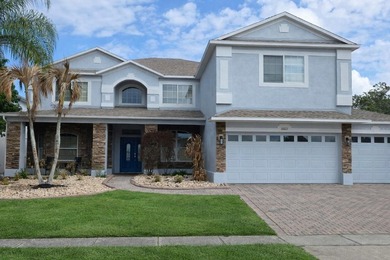 Stunning 4BD/3BA Golf Course Views in Gated North Shore at Lake on North Shore Golf Club in Florida - for sale on GolfHomes.com, golf home, golf lot